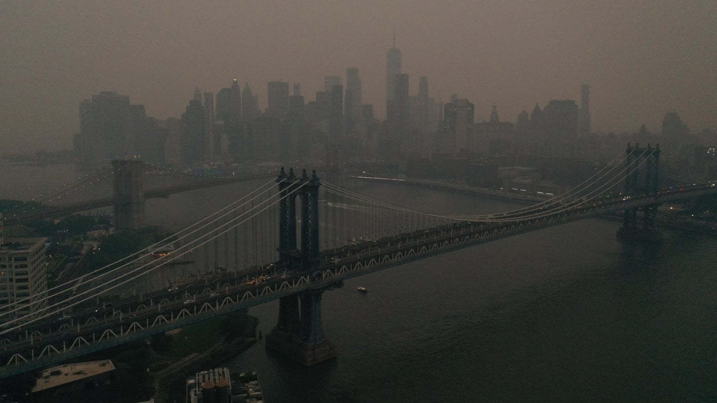 The Downtown Manhattan skyline stands shrouded in a reddish haze as a result of Canadian wildfires on June 6, 2023 in New York City. Over 100 wildfires are burning in the Canadian province of Nova Scotia and Quebec resulting in air quality health alerts for the Adirondacks, Eastern Lake Ontario, Central New York, and Western New York.